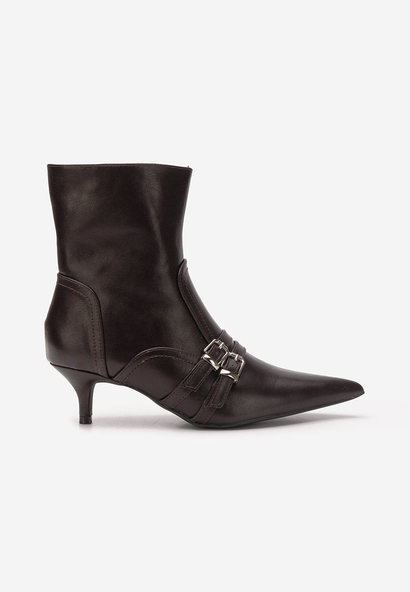 Demi bottes à talons aiguilles avec bouts pointus et boucles