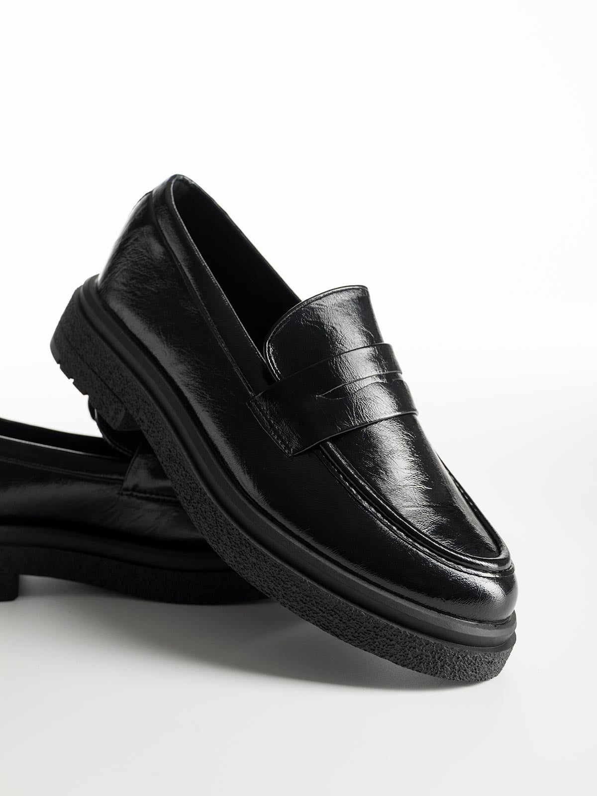 Mocassins à double talon avec bande décorative