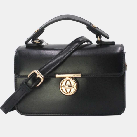 Sac à main avec une bandoulière amovible et une fermeture dorée