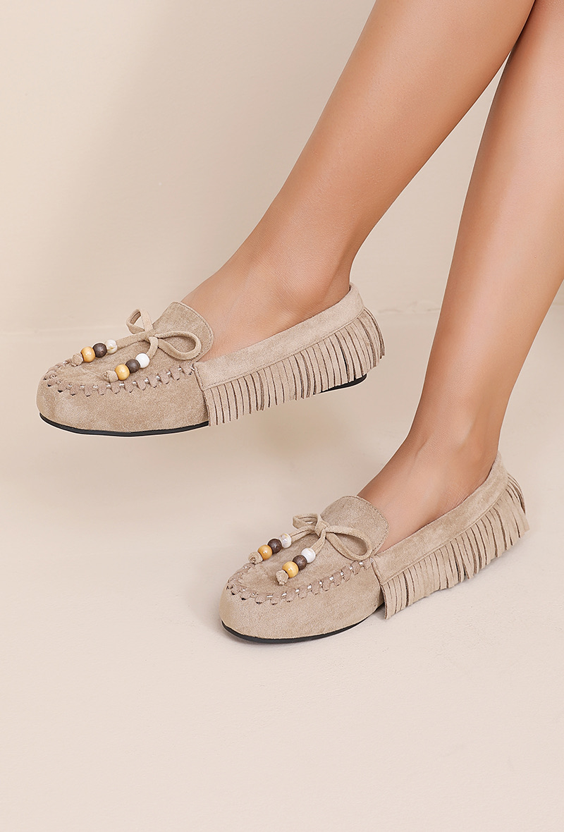 Mocassin à franges et noeud décoratif