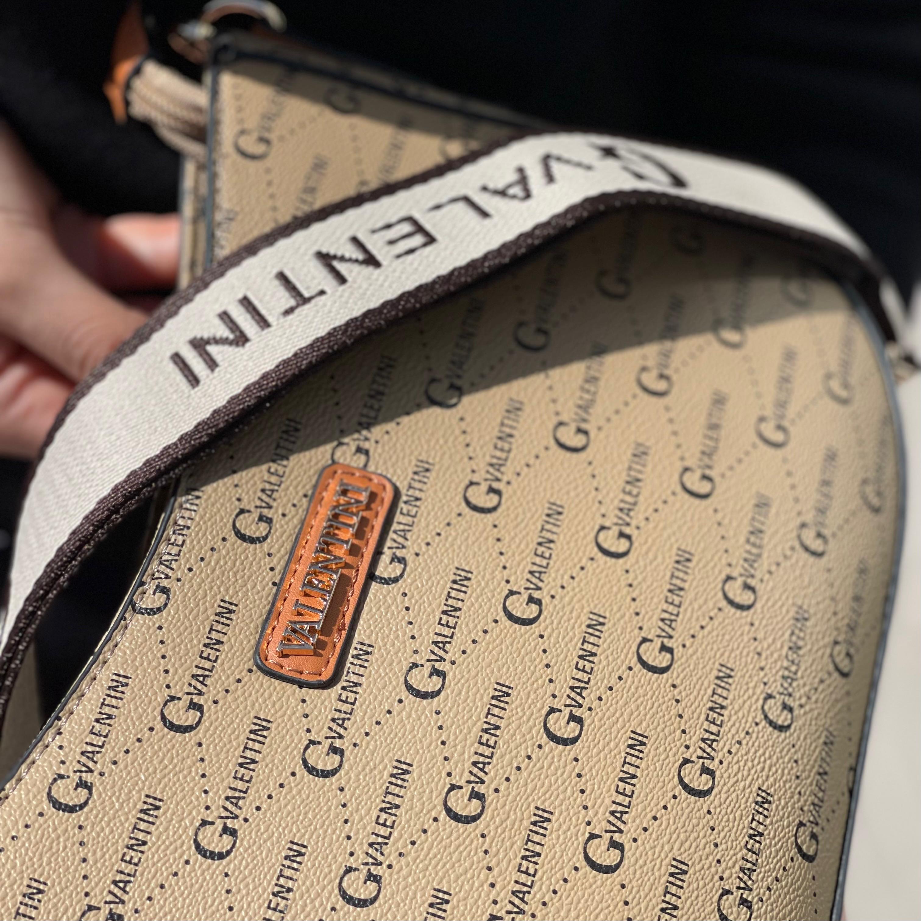 Sac à bandoulière incurvé à motif