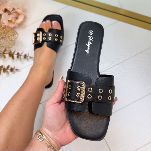 Claquettes en cuir glacé à boucles