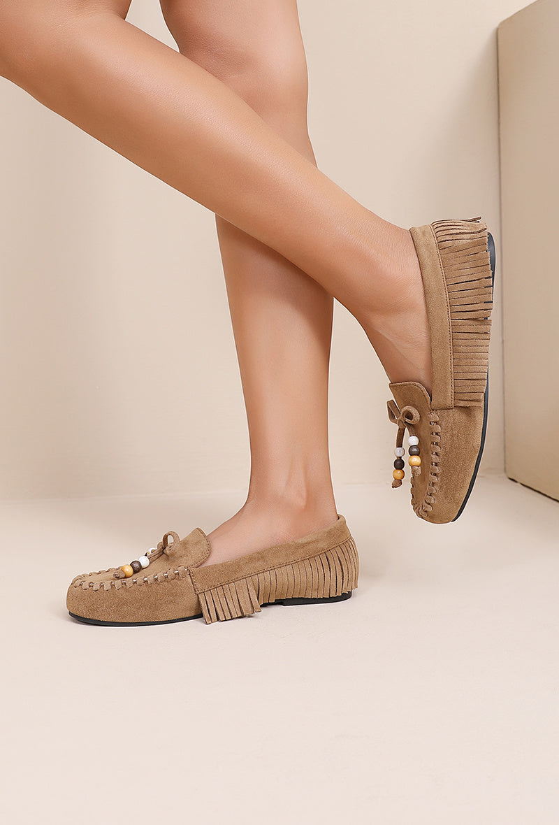 Mocassin à franges et noeud décoratif
