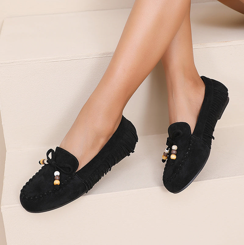 Mocassin à franges et noeud décoratif