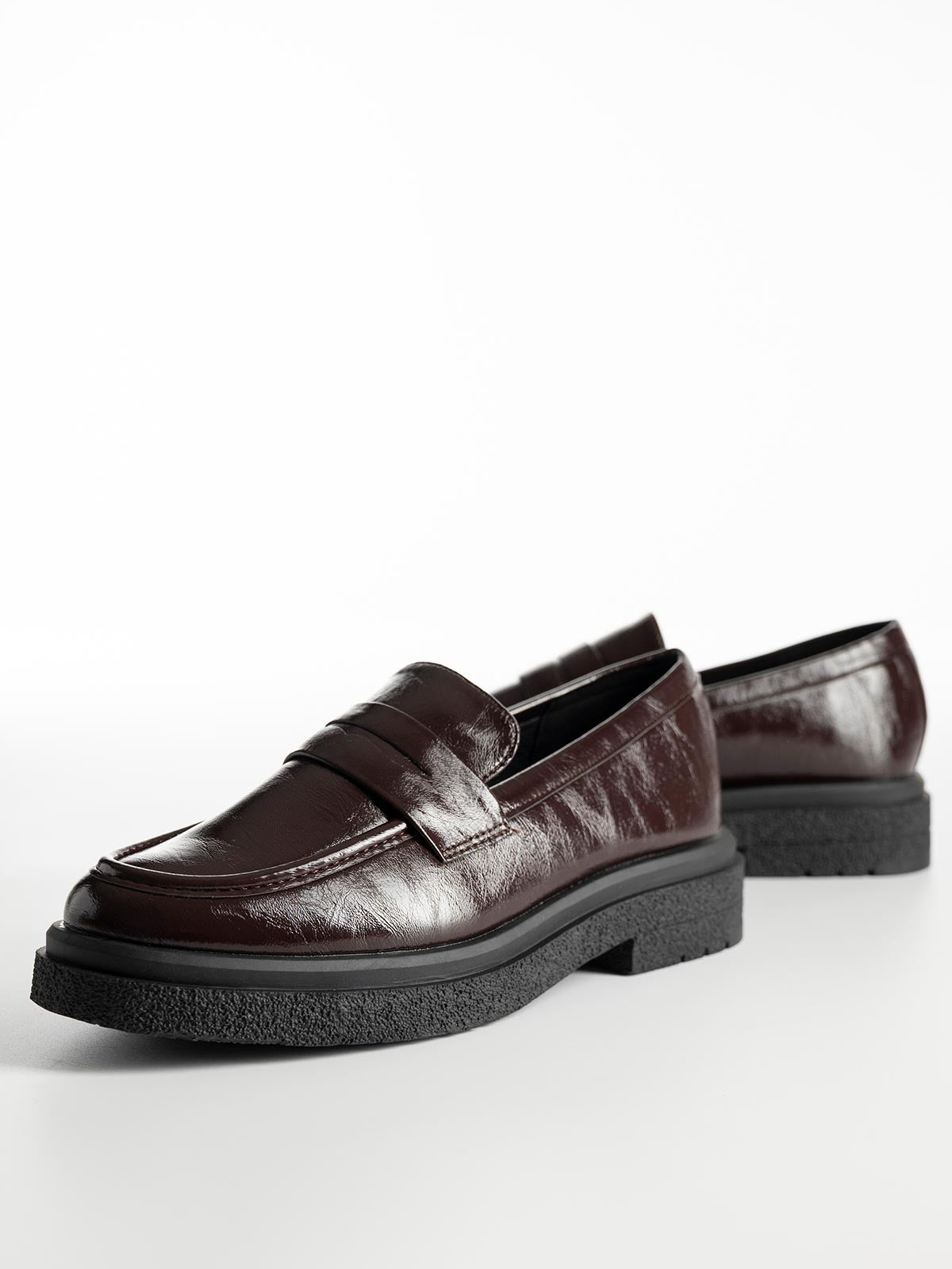 Mocassins à double talon avec bande décorative