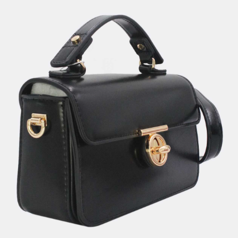 Sac à main avec une bandoulière amovible et une fermeture dorée