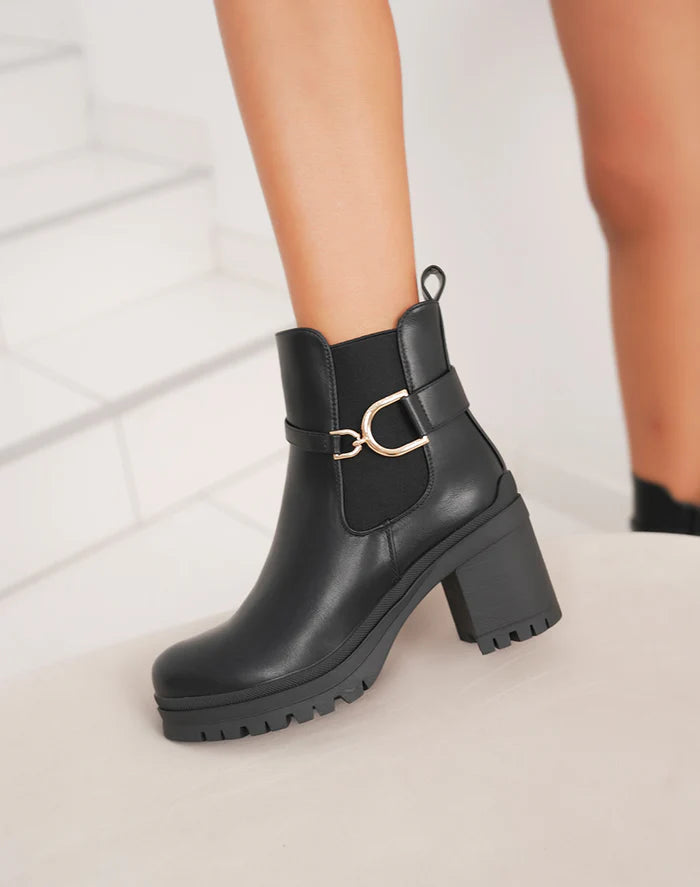 Demi bottes à talon moyen et boucle dorée