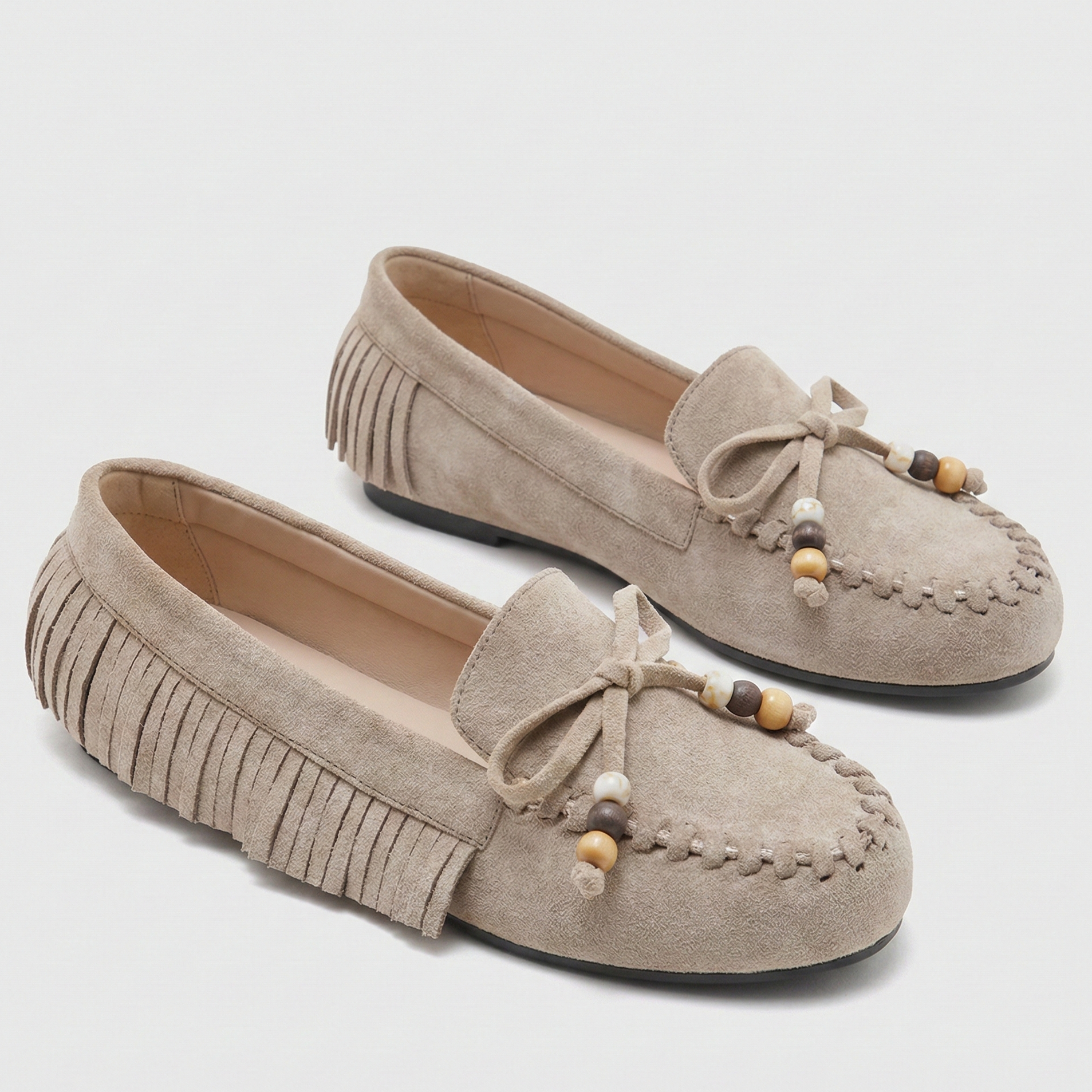 Mocassin à franges et noeud décoratif