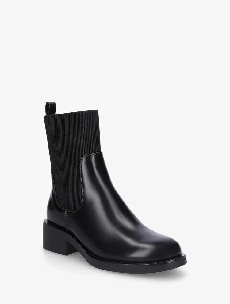 Bottines en simili et tissu côtelé