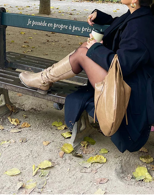 Botteshautes avec lanière et boucle détails en daim